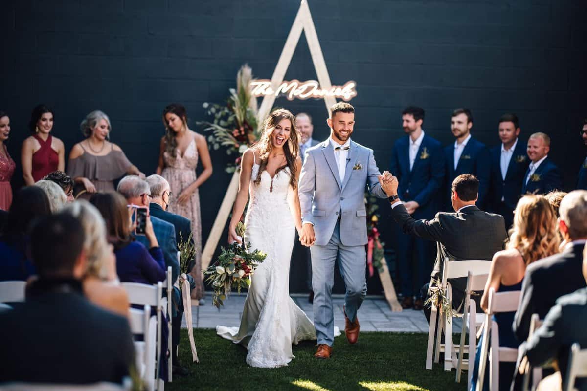 The Brickyard on Main wedding couple looking so happy after their ceremony